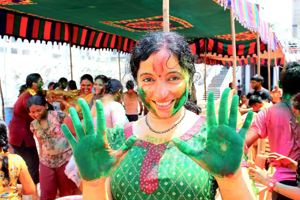 a women celebrating holy in nepal