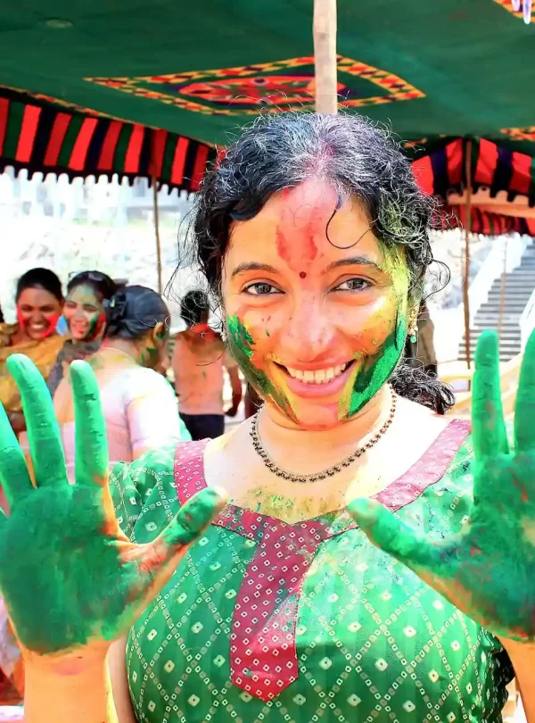 a women celebrating holy in nepal