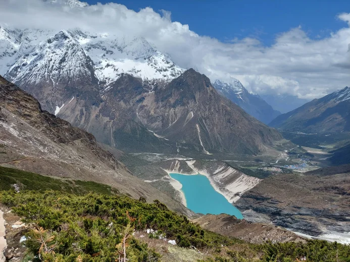 Manaslu Circuit Trek landscape with turquoise lake Birendra